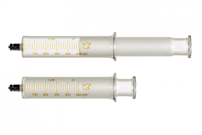 syringes against white background product photography